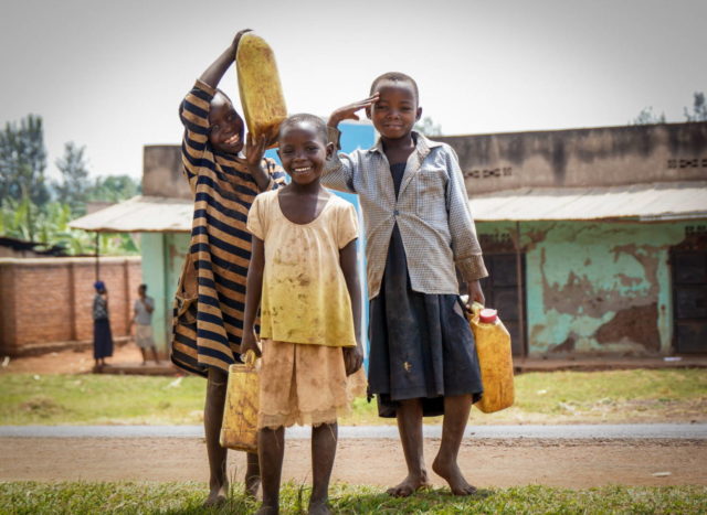 Girls carry water-Rwanda